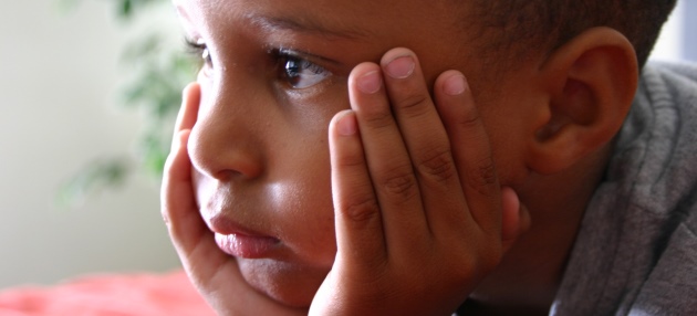 Sad African American boy