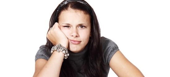 Bemused teenage girl