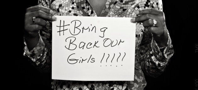 Woman holding Bring Back Our Girls sign