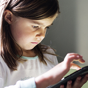 Young girl using tablet