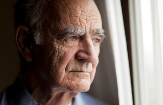 Portrait of elderly man lost in thought