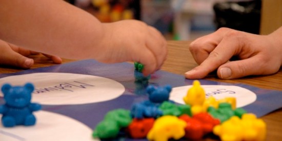 Child working on a project at preschool