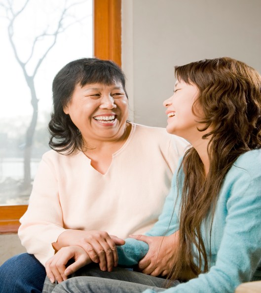 Mother and Daughter laughing